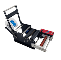 Machine d'étiquetage adhésive semi-automatique de bureau MT-50B pour les boîtes de conserve de vin, les pots, les bouteilles rondes