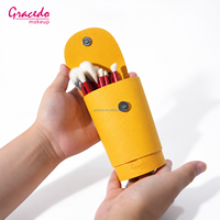 Ensemble de pinceaux de maquillage professionnel Gracedo 10 pièces, étui cylindrique en cuir jaune, poignée rouge, pinceau à raser, pinceau pour fond de teint et poudre