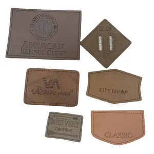 wholesale Custom private brand Embossed logo 100% leather labels real leather tags