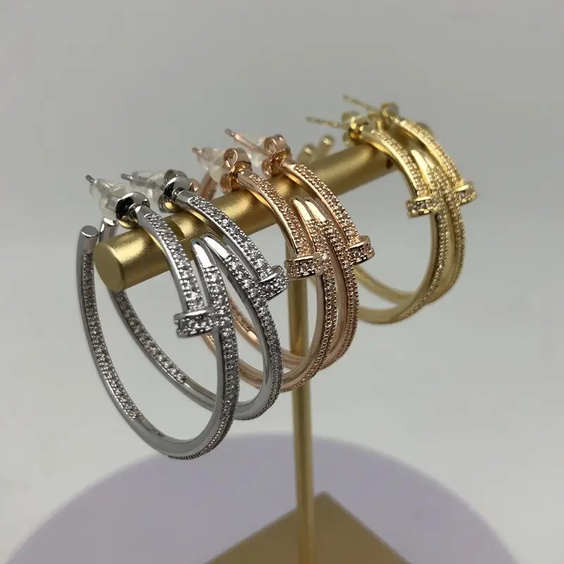 Anting-anting untuk wanita, perhiasan anting-anting desainer besi anti karat mewah merek Hoop mutiara pernyataan berlapis emas halus modis