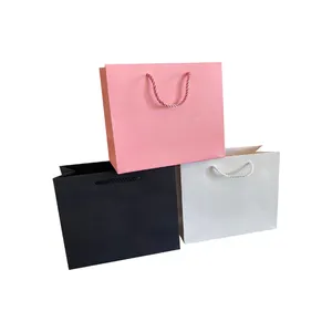 Marque de luxe Logo personnalisé imprimé chaussures sacs à provisions Boutique rose emballage cadeau papier 2mm vêtement emballage ruban traitement