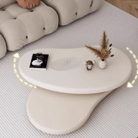 Table basse ovale rotative simple et moderne en crème, respectueuse de l'environnement, pour le salon, meubles extensibles