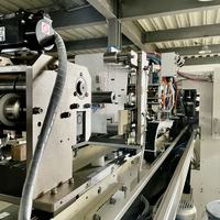Machine d'emballage automatique multifonction haute vitesse pour films de serviettes hygiéniques, avec spécifications à changement facile