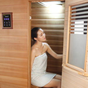 Salle de sauna infrarouge lointain électrique Foshan avec chauffage à 360 degrés pour thérapie corporelle complète, panneau de commande informatisé, alimentation par prise - Product Image 1