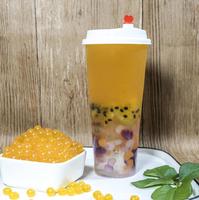Vente en gros de sirop concentré de jus d'orange de 2.5kg saveur sucrée et fruitée riche pour le thé à bulles emballé dans des bouteilles