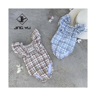 Traje de Baño de Alta Calidad para Bebés con Protección Solar, Mangas con Volantes, Tela Arrugada a Cuadros, Traje de Baño Infantil con Elástico - Product Image 1