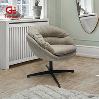 Fauteuil pivotant de luxe moderne en tissu capitonné avec repose-pieds et base métallique pour salon ou chambre à coucher, style détente