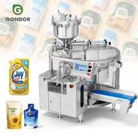 Machine d'emballage rotative multifonctionnelle pour sachets souples préformés, pour liquides, jus et eau