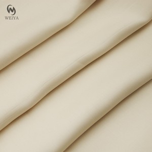 Chine Tissé Fabricant Doux Bébé Vêtements Mètre <span class=keywords><strong>Prix</strong></span> Solides Sergé Uni Satin Glace Lyocell Tissu - Product Image 3