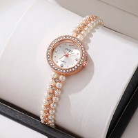 Bracelet-montre transfrontalier de luxe léger en forme de goutte d'eau avec perles, mouvement à quartz, style médiéval, design perlé fait main