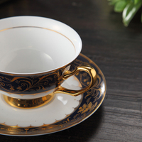 Luxuriöses Modernes Langlebiges Keramik-Knochenporzellan Umweltfreundliches OEM ODM Schwarzes Niedliches Anpassbares Kaffeetassen- und Untertassen-Geschenkset