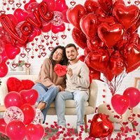 Décorations de la Saint-Valentin rouges avec des ballons en forme de cœur rouge et un ballon « Love » pour des décorations romantiques de la Saint-Valentin