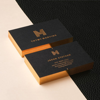 Cartes de visite personnalisées de luxe noires avec estampage à chaud, bordure dorée, découpe laser argentée holographique, papier artistique