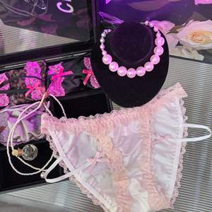 Braguitas de seda helada de alta calidad, transpirables, de talle bajo para mujer, sensual tanga de encaje con lazo y estampado de leopardo para adolescentes - Product Image 6