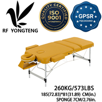 Table de massage portable moderne pliable en aluminium à 3 sections OEM, jaune, en PU imperméable, réglable en hauteur, pour spa, physiothérapie, tatouage, école
