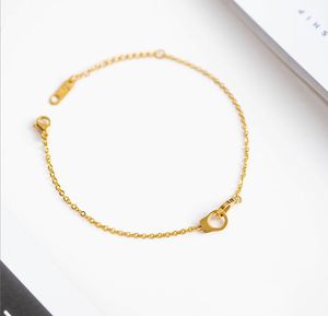 उच्च गुणवत्ता महिलाओं के गहने सोना मढ़वाया स्टेनलेस स्टील धातु मिठाइयां श्रृंखला नकली घर गिरफ्तारी कंगन - Product Image 2