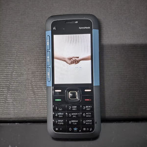 Teléfono <span class=keywords><strong>Celular</strong></span> <span class=keywords><strong>5310</strong></span> Xpress Music para Personas Mayores, Clásico GSM con Sistema Operativo Symbian, Pantalla TFT, Cámara de 2MP, Batería de 500-999mAh, Pantalla a Color de 1.77 Pulgadas, Usado - Product Image 1