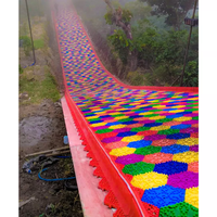 Équipement de divertissement pour parcs d'attractions : Fabricant de toboggans tubulaires secs arc-en-ciel, Toboggan Donut, Toboggan pneu Donut pour aire de jeux intérieure, Jeux familiaux