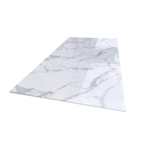 Meilleure vente en gros 1220x2440 Panneau mural en marbre PVC Panneau en PVC pour salles de bain et chambres à coucher Écologique et non toxique