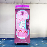 Machine à prix à ciseaux verticale commerciale à monnayeur, avec bordure néon rose et roue mobile, pour centre commercial et salle d'arcade, garantie 1 an