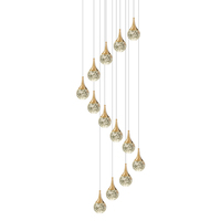 Lustre en cristal en spirale éblouissant, finition luxueuse, cascade de lumières multiples, grand lustre pour escalier