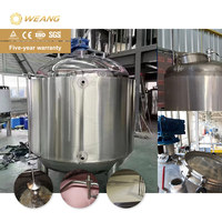 Machine de remplissage de liquides semi-épais (miel) avec réservoir de mélange de 1000 L et système de pesage à double tête