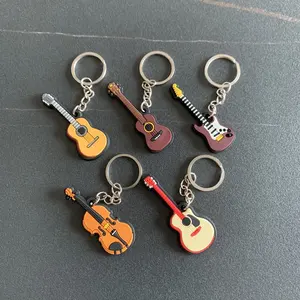 Móc Khóa Nhạc Cụ Mini Sáng Tạo Móc Chìa Khóa Kèn Saxophone Đàn Guitar Bằng Silicon Dễ Thương Ba Lô Trang Trí Xe Hơi Trang Sức Nhạc Sĩ