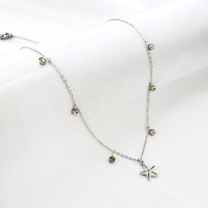 Collier Pendentif Étoile en Acier Inoxydable Plaqué Or 18 carats, Étanche, avec Chaîne et Zircons Colorés en Forme d'Étoile de Mer – Nouvelle Collection Tendance - Product Image 6