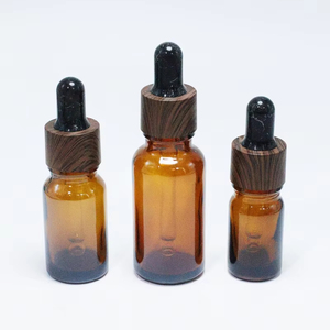 Wholesale Empty Cosmetic Amber Glass Body Oil 15ml 20ml 30ml <b>Dropper</b> <b>Bottle</b> with Bamboo Cap - Product Image 4
