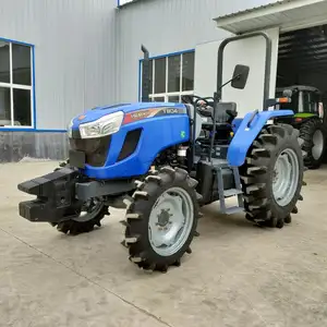 Used agricultural tractor with tiller and seeder mower