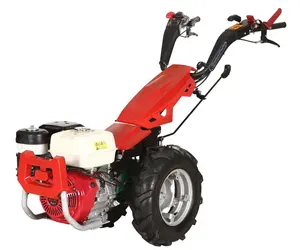 Hand operated 2 wheel walk behind mini farm tractor reversible offset handles enable use of sickle bar, flail mower, rotary hoe