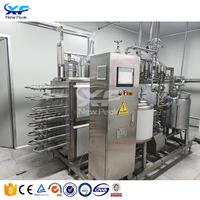 Pasteurisateur tubulaire automatique de jus de pomme Mangue orange Machine de pasteurisation de jus de canne à sucre Équipement de pasteurisation en vente
