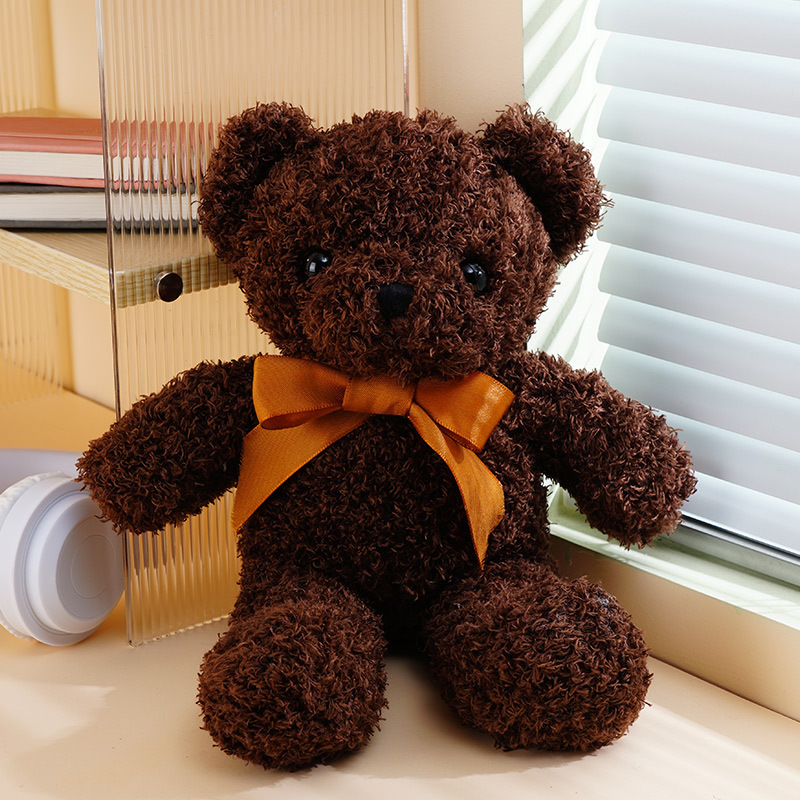 Orso marrone scuro con papillon