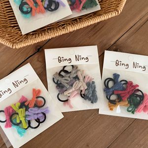 Set di 10 Mini Elastici per Capelli con Fiocco in Filato Colorato, Carini per Codini da Bambina - Product Image 2