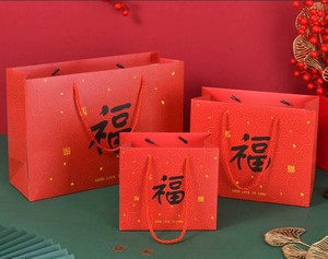 Chinesische Glücksbringer-Fu-<span class=keywords><strong>Ping</strong></span> Offsetbedruckte, individuell gefärbte rote Kartonagen mit Kordelzug, umweltfreundlich, recycelbar, für Feiertage und Geschenke - Product Image 1