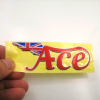 Étiquettes d'emballage auto-adhésives 3D en plastique PVC avec logo personnalisé de sortie d'usine pour ordinateur et téléphone portable