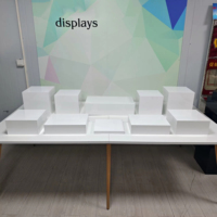 Étagère d'angle carrée en plastique blanc pliable moderne sur mesure, présentoir de buffet, socle pour aliments