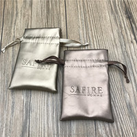 Pochette de parfum cosmétique en cuir pu avec cordon de serrage logo Deboss Sac en cuir marron métallique durable pour bijoux