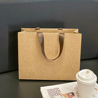 Sacs shopping en papier de luxe personnalisés avec poignées en ruban, logo imprimé pour les boutiques de vêtements et l'emballage de cadeaux