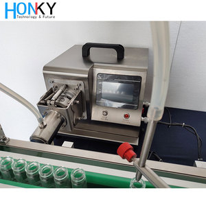 Máquina de llenado de líquidos de escritorio para pequeñas empresas Foshan, bomba de cerámica, línea de llenado de escritorio de medición automática para aceite médico - Product Image 2