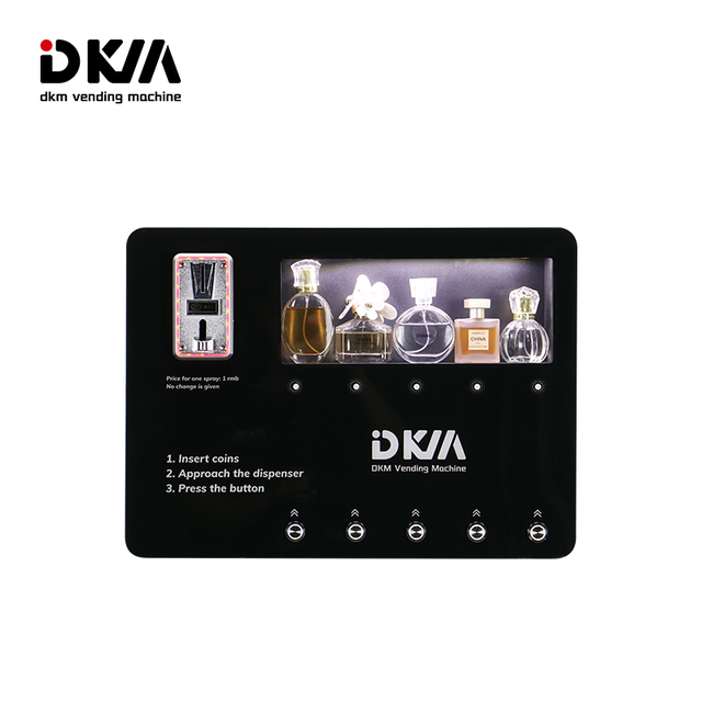 DKM Small Mini Wall Mounted Coin Operated Fragrance Cologne Perfume Spray Vending Machine for Sale