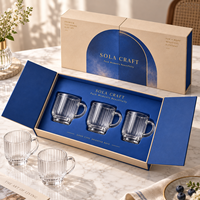 Boîtier en carton rigide estampé pour collections de verrerie, avec porte double et recyclable