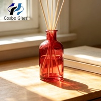 Bouteilles vides de diffuseur à bâtonnets en verre cylindrique rouge de luxe, 50 ml et 100 ml, vente en gros