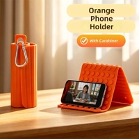 Nouveau support de téléphone pliable en silicone avec mousqueton, support portable pour tablette et ordinateur portable, antidérapant, multi-angles réglables, idéal pour les voyages en avion
