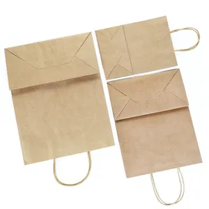 Borsa di carta per imballaggio di vestiti di lusso personalizzata di grandi dimensioni con il tuo Logo borsa artigianale in carta Kraft marrone riciclata