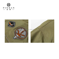 Veste de bombardier bouffante broderie multiple Patch Logo 100% Nylon Satin Martial extérieur portant un rembourrage en coton