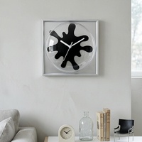 Nouvelle horloge murale abstraite en métal de style nordique, rétro, haut de gamme, tendance, design Bauhaus silencieux pour salon