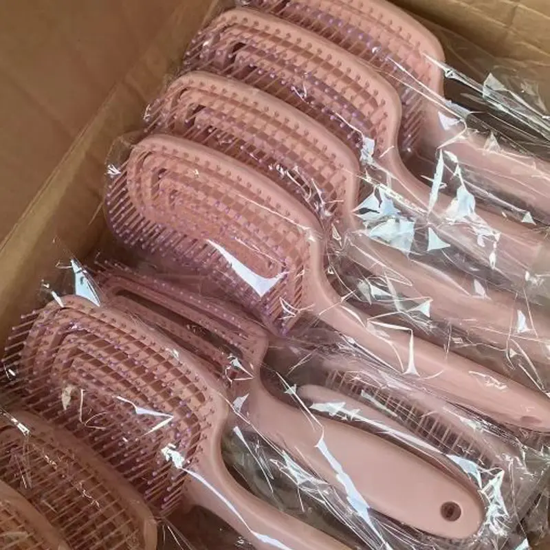 Style personnalisé en plastique Massage humide et sec bouclé antistatique en plastique poignée courbe évent naturel démêlant brosse à cheveux démêlante