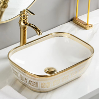 Lavabo de salle de bain rectangulaire en céramique dorée de luxe avec égouttoir pour montage sur robinet monotrou pour la maison ou l'hôtel