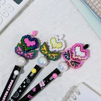 Stylo gel de décompression rotatif personnalisable pour filles 0.5mm perles de fleurs en plastique stylos à logo Instrument d'écriture bricolage